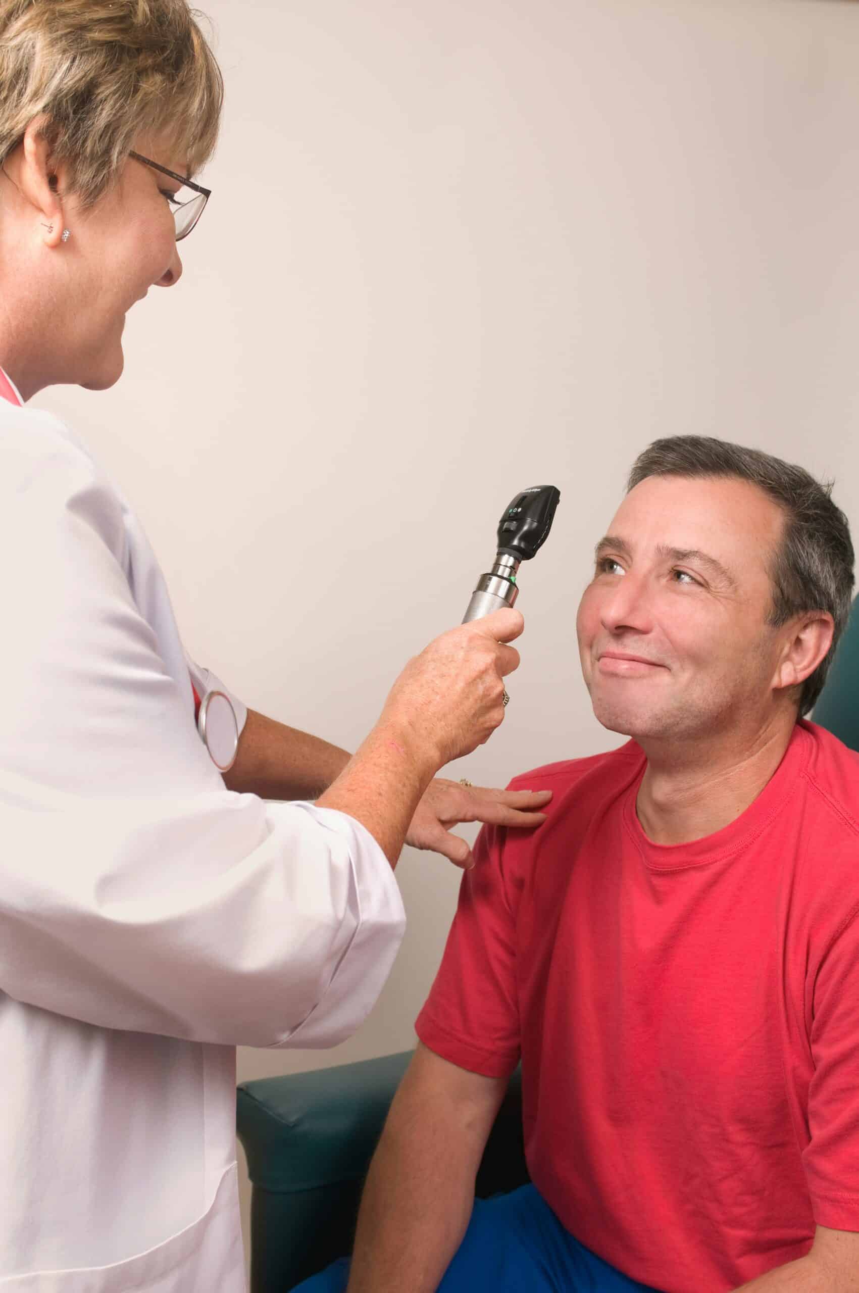 Doctor providing health check on Perth adult patient for preventative health checks